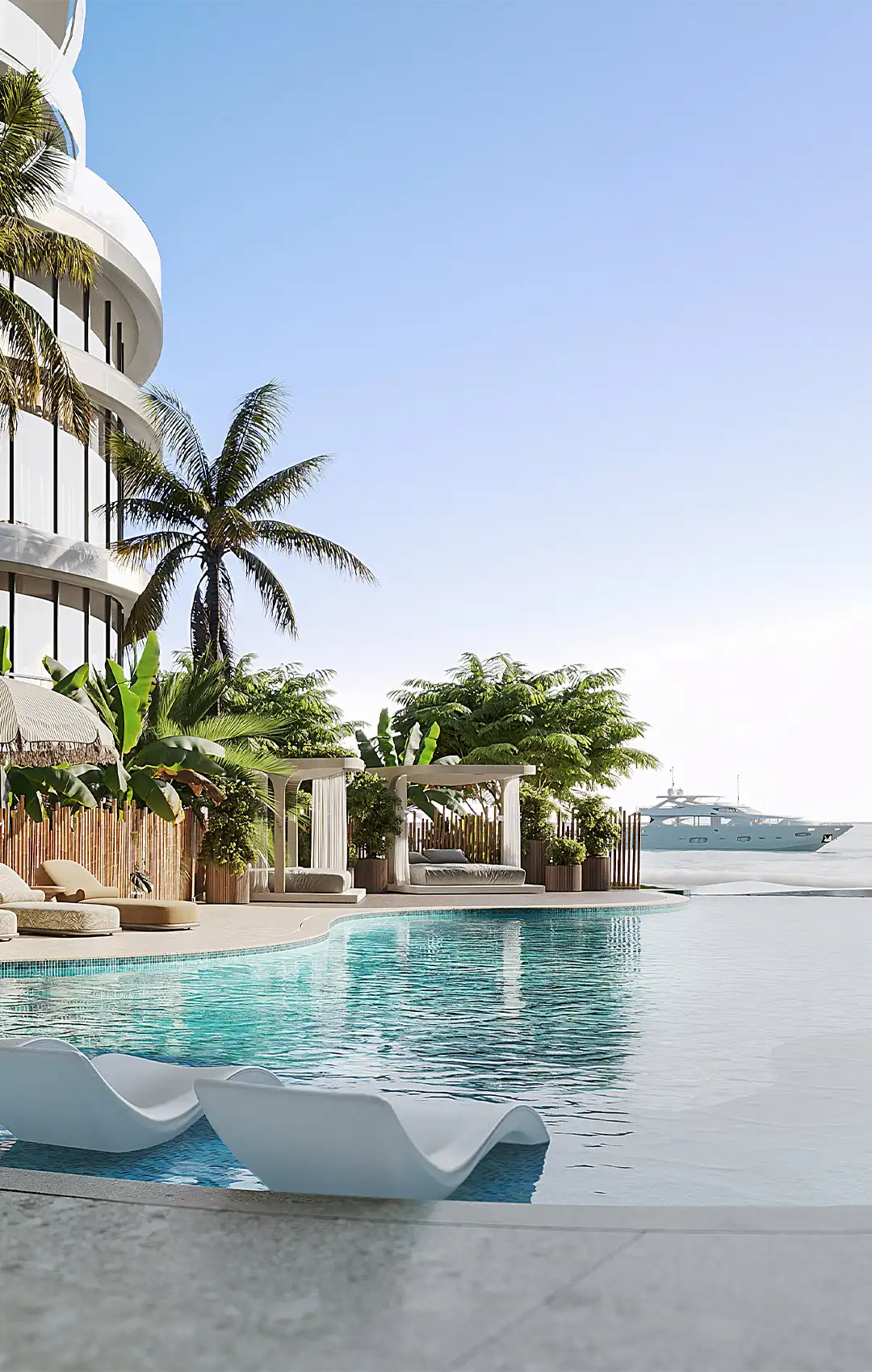 AMRA beachfront infinity pool under palm trees