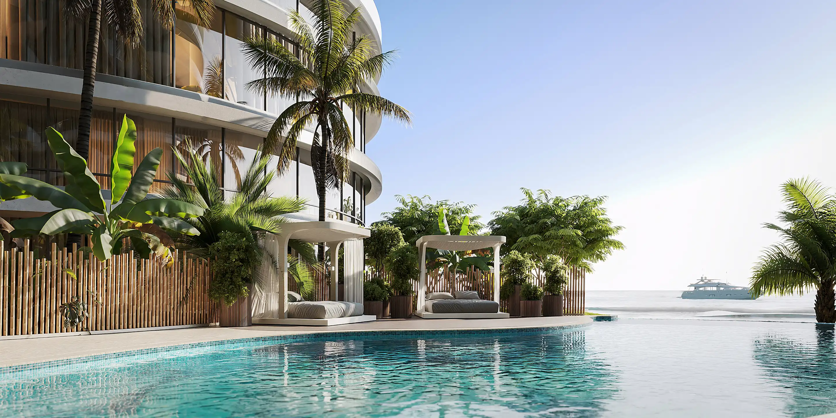 AMRA beachfront infinity pool under palm trees