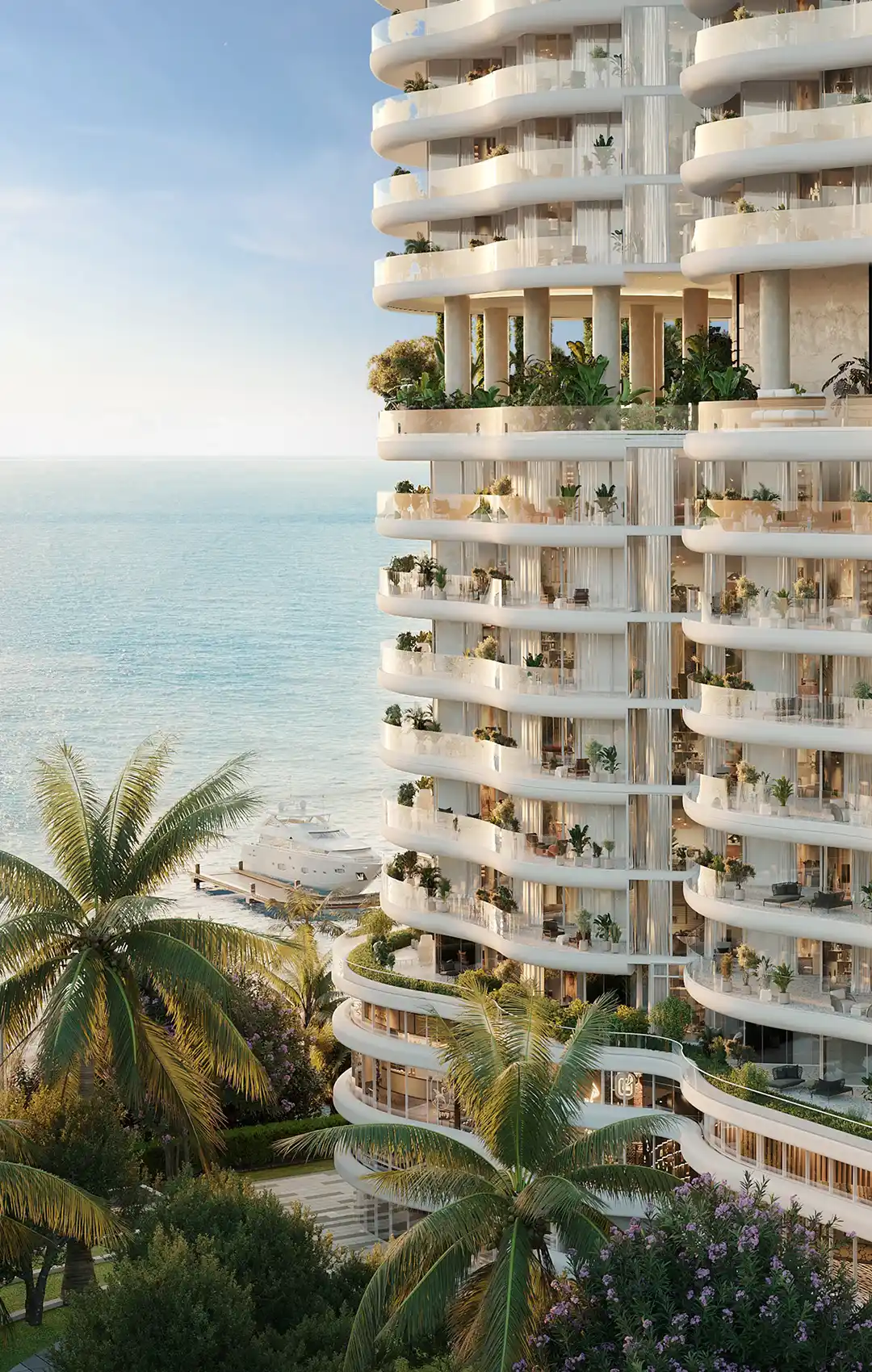 AMRA beachfront infinity pool under palm trees