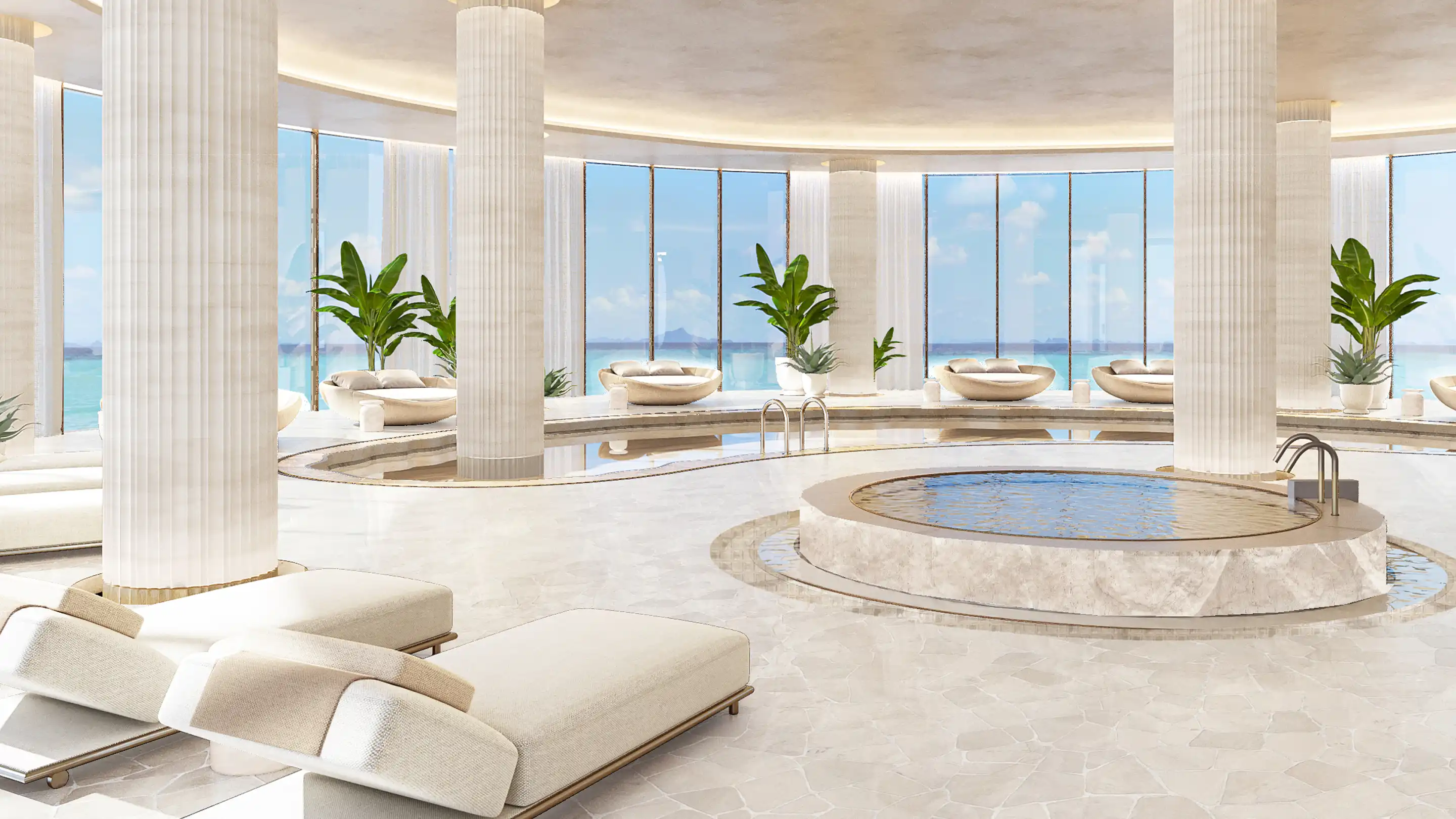 AMRA beachfront infinity pool under palm trees